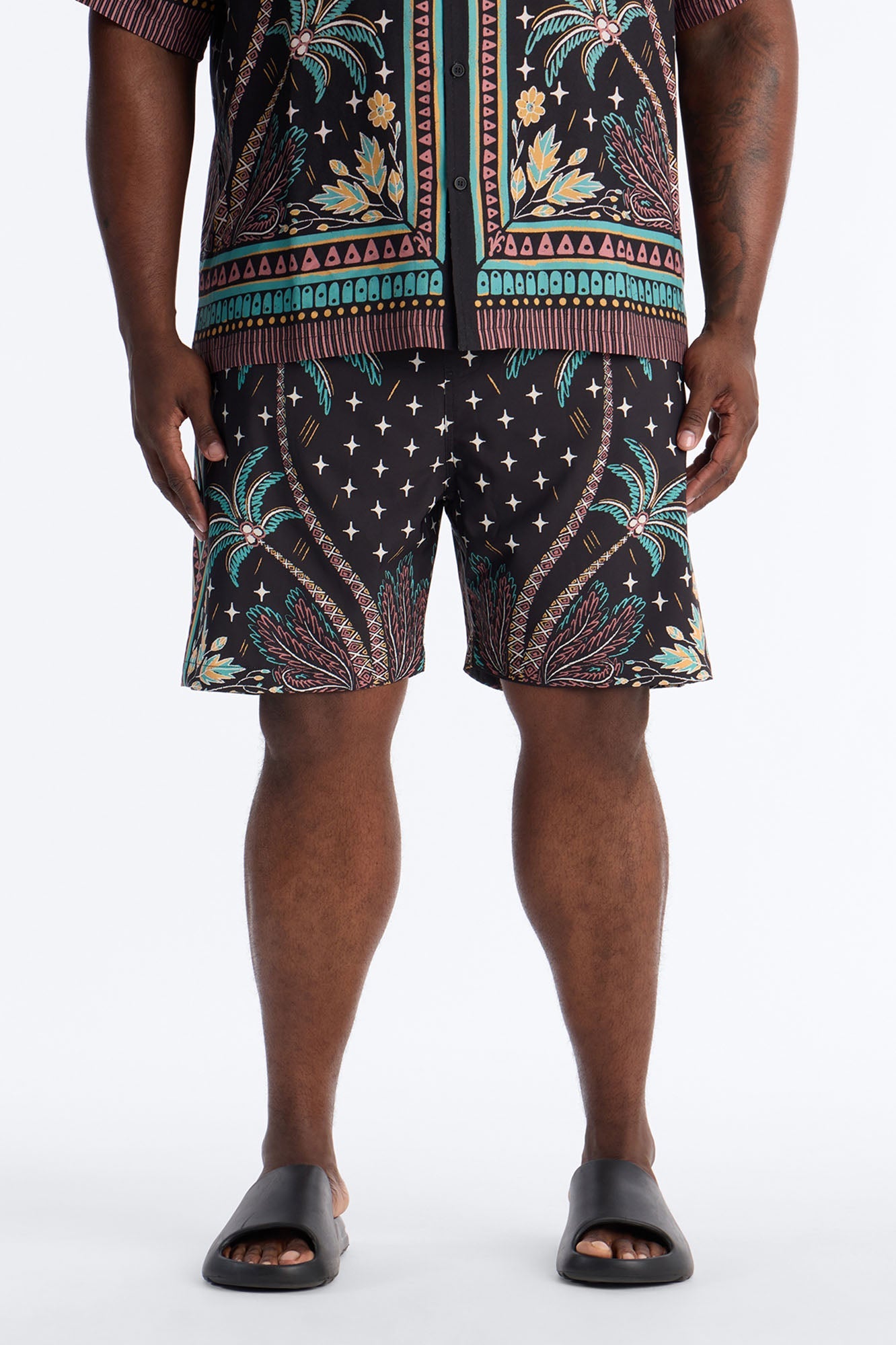 Tropical Twilight Resort Swim Trunk 7″ - Black